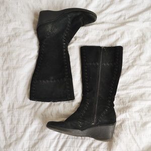 Long stitched moccasin style boots